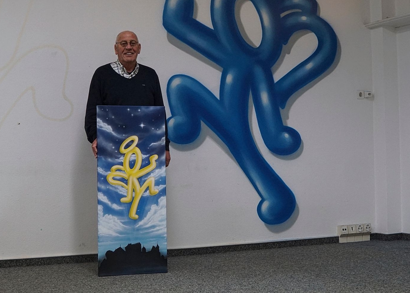 Werner Christen mit dem Originalbild des Banners. Das gemalte Bild kann man an der Verlosung ergattern.Foto:  Rinaldo Feusi