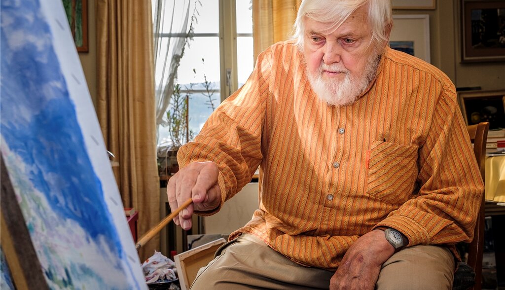 Immer noch sehr aktiv: Der Reinacher Kunstmaler Kurt Hediger in seinem Atelier beim Malen. Foto: Peter Siegrist Immer noch sehr aktiv: Der Reinacher Kunstmaler Kurt Hediger in seinem Atelier beim Malen. Foto: Peter Siegrist
